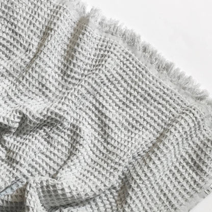 Cozy folded Waffle Turkish Cotton Blanket in Gray by Belle Aura