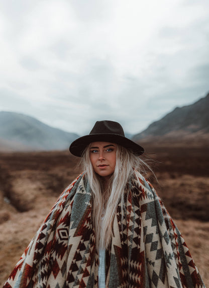 Woman in nature wrapped in Secoya Blanket by belle aura