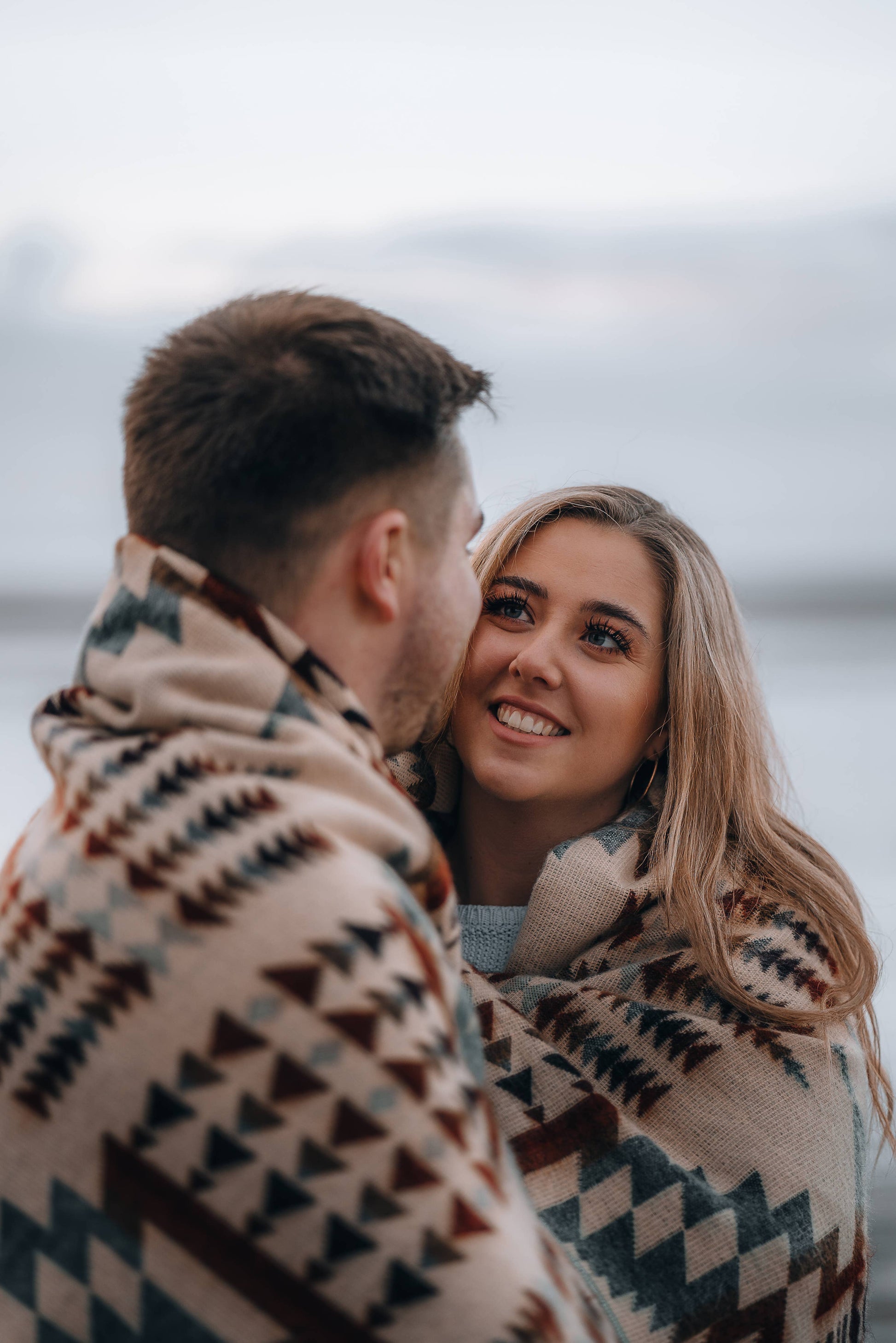 Couple wrapped in Secoya Blanket by belle aura