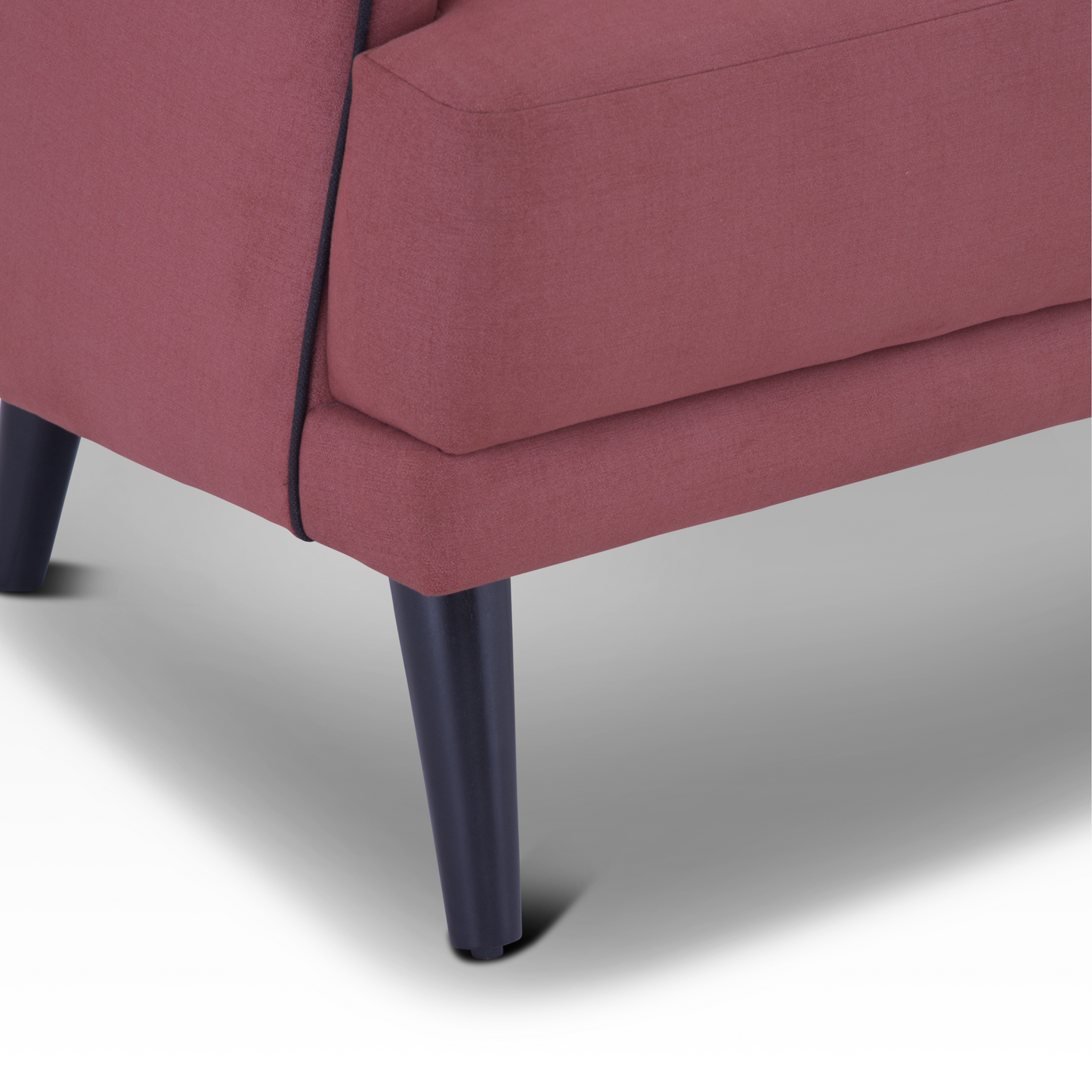 Beleza Accent Chair In Ruby Amber – Close Up Of Chair Leg With Sleek Black Finish