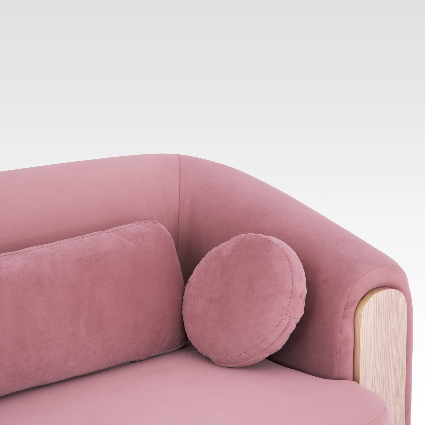 Close-up of Mitda Sofa in Coral Blush armrest and cushion