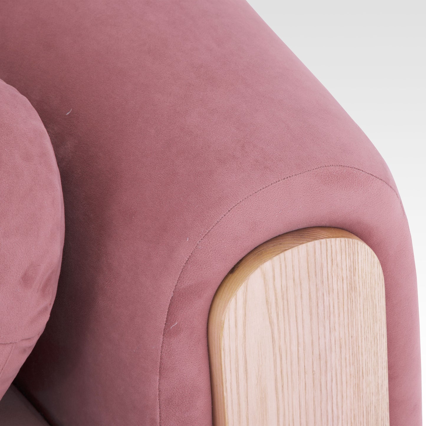 Close-up of Mitda Sofa in Coral Blush armrest