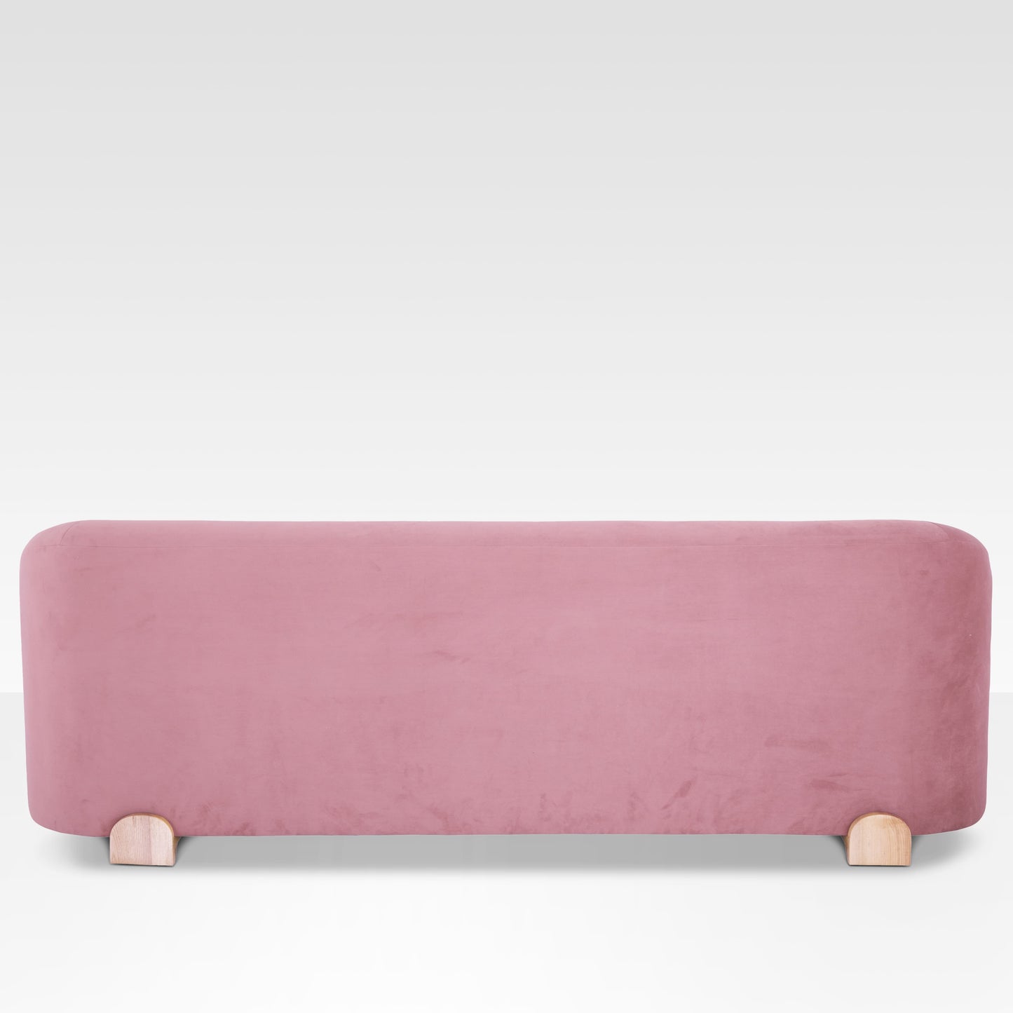 Close-up of Mitda Sofa in Coral Blush wooden leg and upholstery