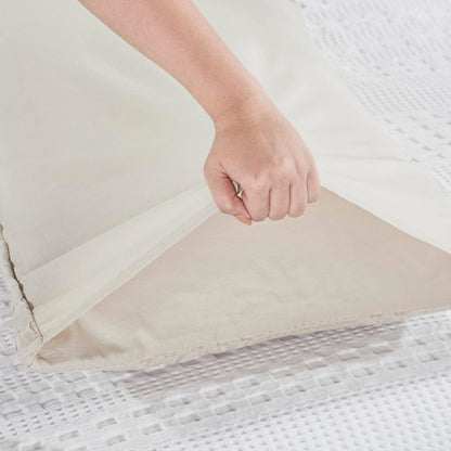 Hand adjusting Waffle Weave pillow cover by belle aura