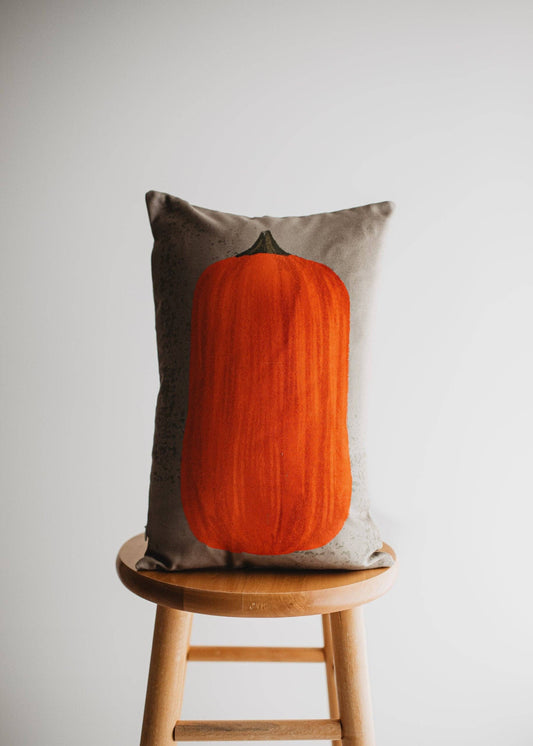 Pumpkin lumbar pillow by Belle Aura on stool