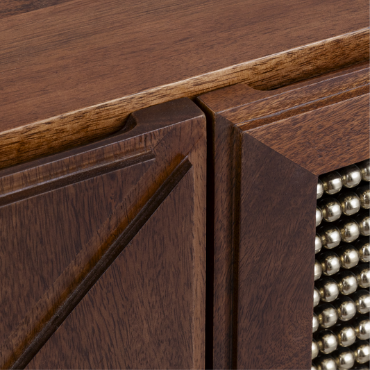 A macro close-up of the delicate, hand-strung wooden beads on the Aurelia Sideboard, showcasing the contrasting vertical and horizontal patterns.
