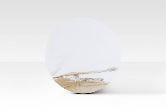 An overhead view of the Concord nesting table pair in black, emphasizing the distinct biomorphic cloud shapes and the layered solid marble surfaces.