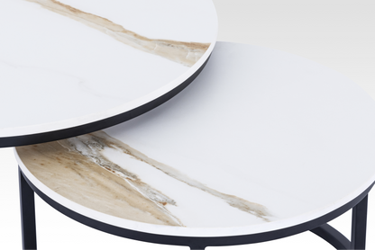 Macro close-up of the black Concord table’s edge, highlighting the durable matte black frame and the unique natural texture of the solid marble veining.