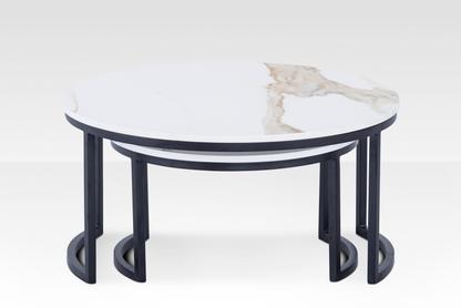 Front view of the black Concord nesting tables layered, showcasing the architectural C-base frame and the space-saving functionality.