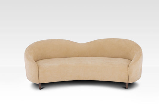A view from above showing the deep curve and the rounded arms of the Aaria sofa.