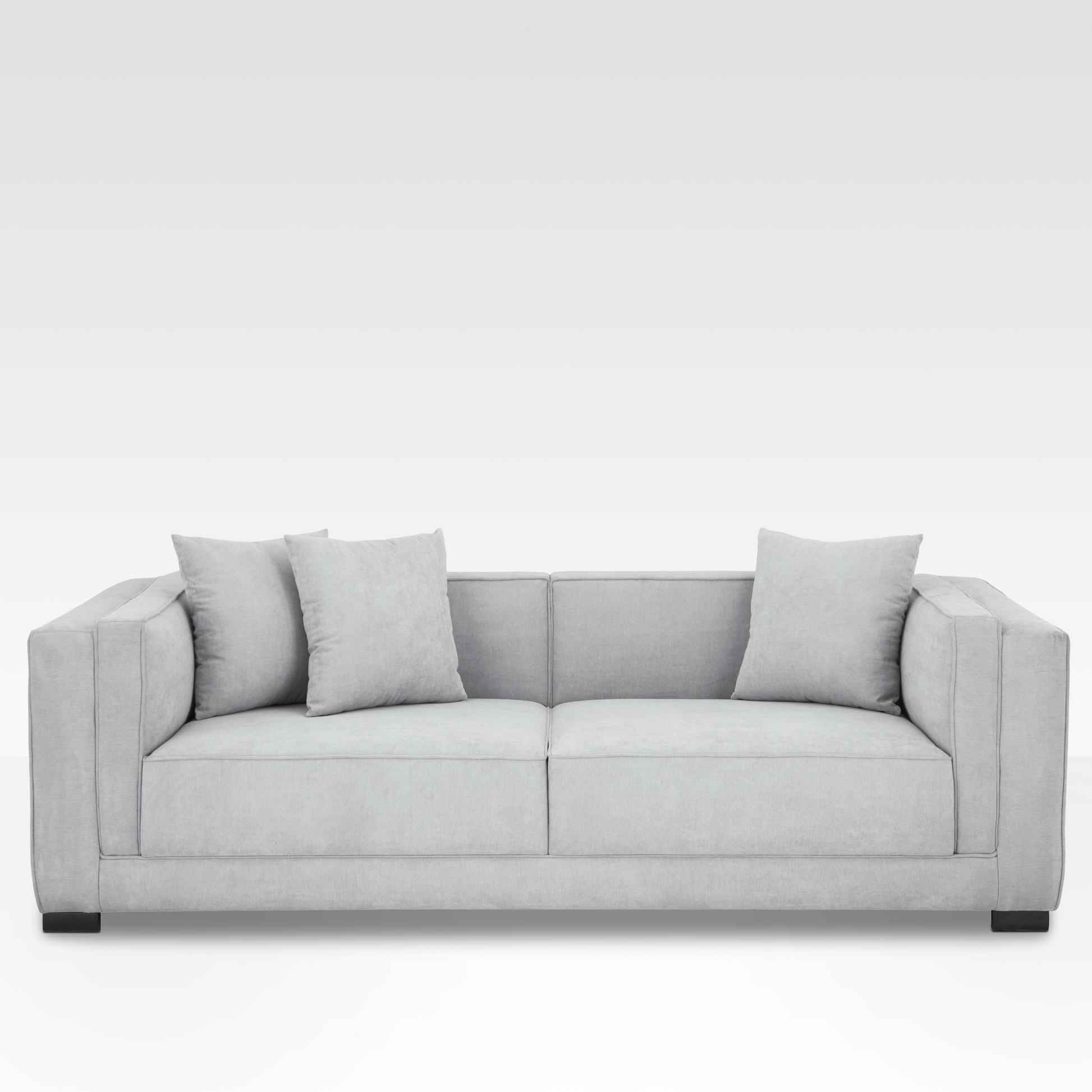 Front view of the Elysian sofa in Steel gray fabric, featuring a symmetrical cushion grid and minimalist dark steel block legs.