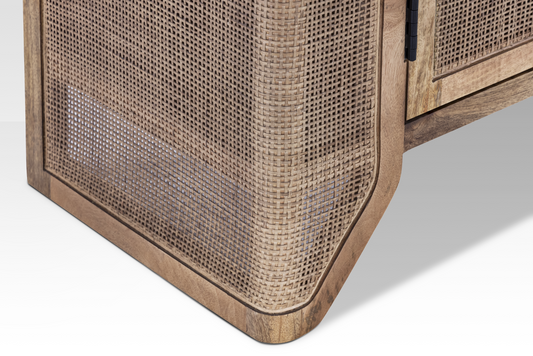 Close-up of the elegant mid-century inspired legs on the Filigree Mango Wood cane Sideboard.