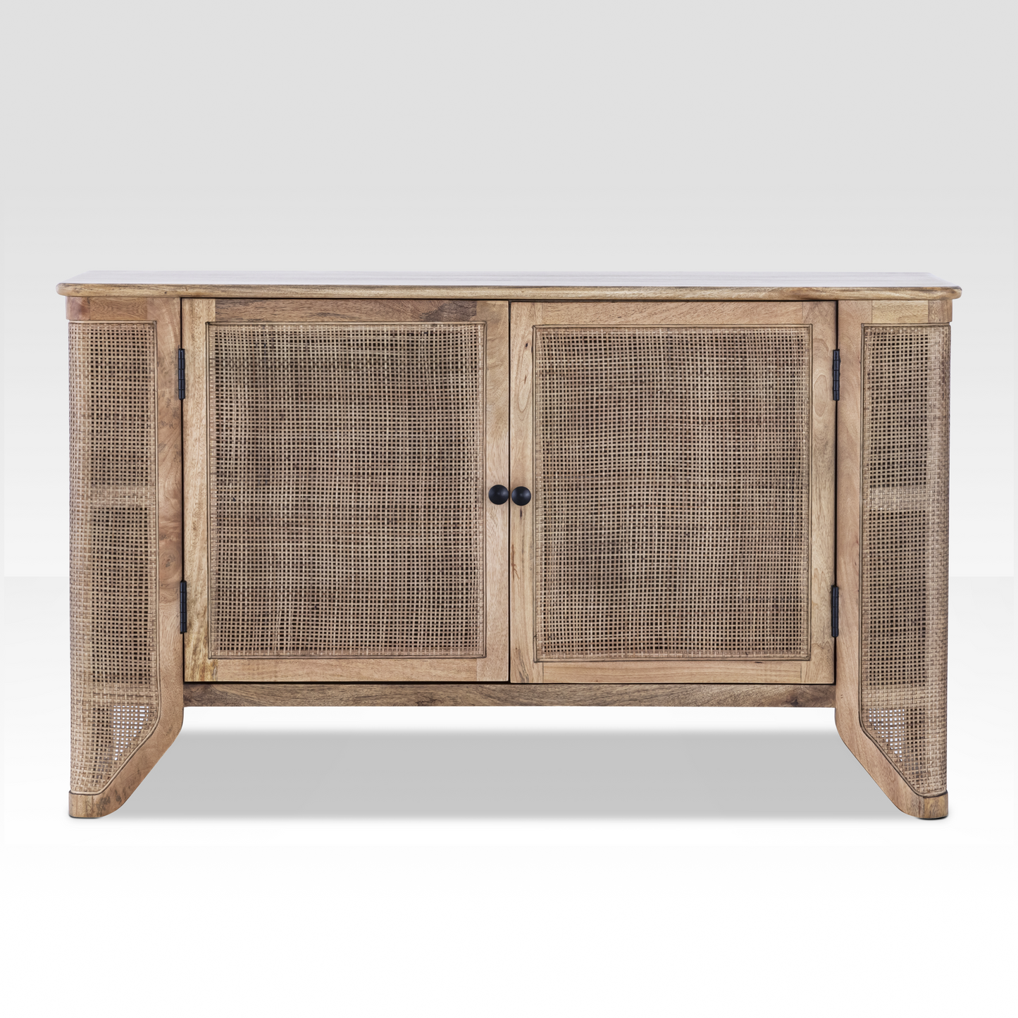 Full front view of the Filigree Sideboard handcrafted from light mango wood with natural hand-woven cane door panels.