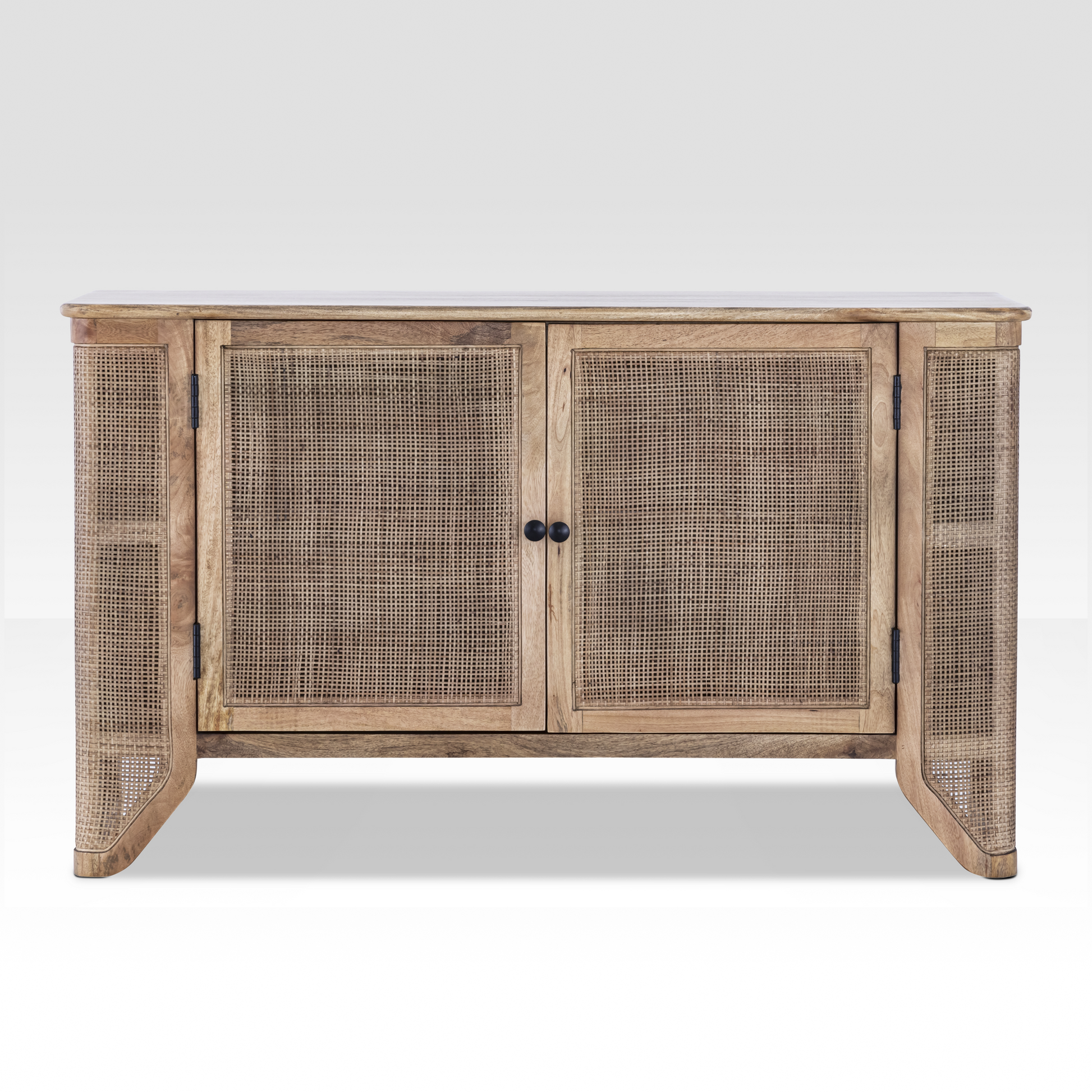 Full front view of the Filigree Sideboard handcrafted from light mango wood with natural hand-woven cane door panels.