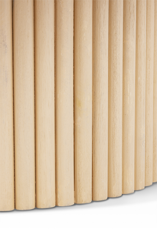 Macro close-up of the Grove Coffee Table base, showing the individual vertical wood rods and handcrafted fluted texture.