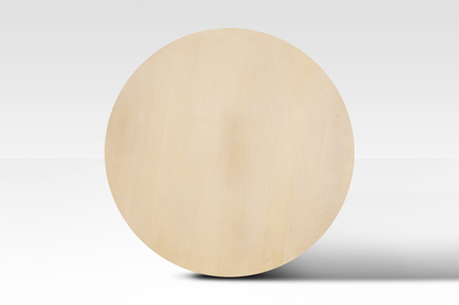 A perfectly circular overhead view of the Grove Coffee Table in natural wood, showcasing its smooth minimalist surface and organic grain.