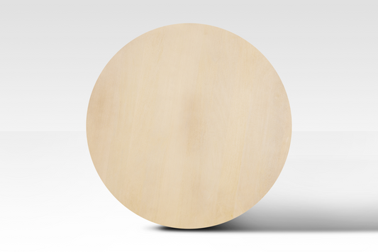A perfectly circular overhead view of the Grove Coffee Table in natural wood, showcasing its smooth minimalist surface and organic grain.