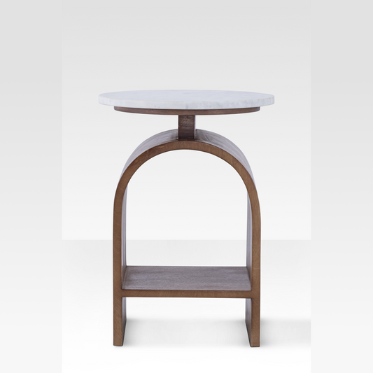 A straight-on profile of the Kromme End Table highlighting the perfect symmetry of its bentwood arch and the thin floating marble surface.
