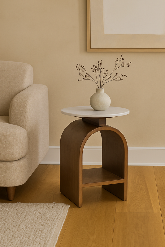 A sunlit Japandi-style living room featuring the Kromme End Table with a floating marble top, styled with a ceramic vase and dried florals.