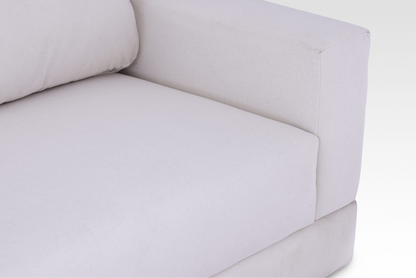 A top-down detail view of the seamless single bench seat block on the Vanilla Cream Kyra sofa.