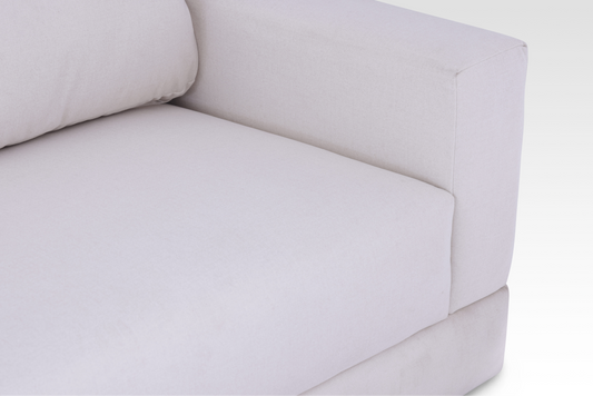 A top-down detail view of the seamless single bench seat block on the Vanilla Cream Kyra sofa.