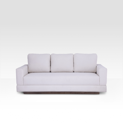 A straight-on view of the Kyra sofa in Vanilla Cream, showcasing the seamless bench seat and three plush back cushions.