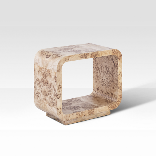 An angled view of the Luca End Table in Mappa Burl wood, featuring a seamless waterfall edge and an open-rectangular sculptural silhouette.