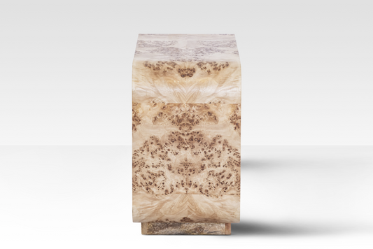 A side perspective of the Luca End Table showcasing the intricate swirling grain and natural 'eyes' of the rare Mappa Burl veneer.