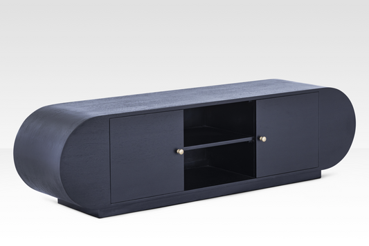 Angled perspective of the Mira Sideboard, emphasizing the soft curved capsule ends and substantial chunky base.