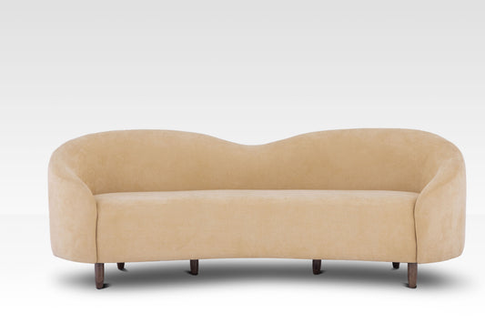A straight-on view of the Aaria sofa, showing the clean lines and comfortable seating area.