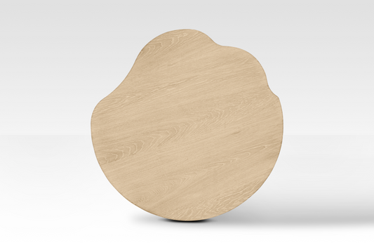 Top-down view of the large Nook Nestled Coffee Table in natural oak, highlighting the organic cloud-shaped wavy edges and premium wood grain.