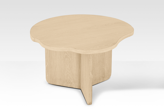 Top-down view of the natural oak nestled table highlighting the beautiful wood grain and organic wavy-edge design