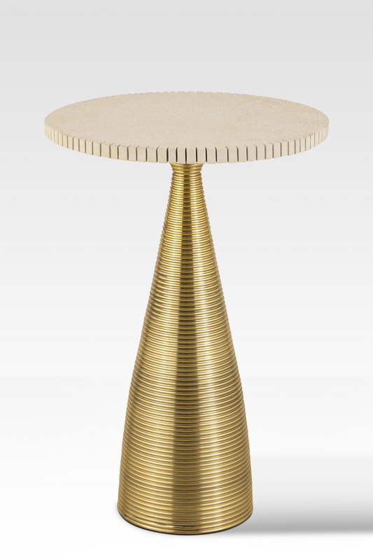 An angled view of the Oasis End Table featuring a notched natural sandstone top and a conical ribbed gold aluminum pedestal base.