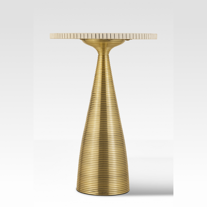 A straight-on profile of the Oasis End Table highlighting the tapered aluminum base and the precision-cut 'cog-edge' sandstone top.