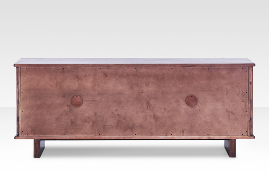 Rear view of the finished Quattro Sideboard back panel, featuring dual circular media cutouts for organized cable management.