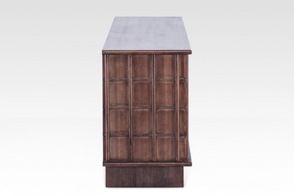 Side profile of the Quattro Sideboard, showcasing its clean vertical lines and sophisticated dark wood finish.