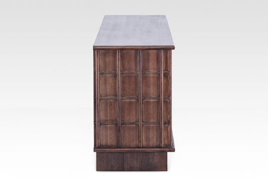 Side profile of the Quattro Sideboard, showcasing its clean vertical lines and sophisticated dark wood finish.