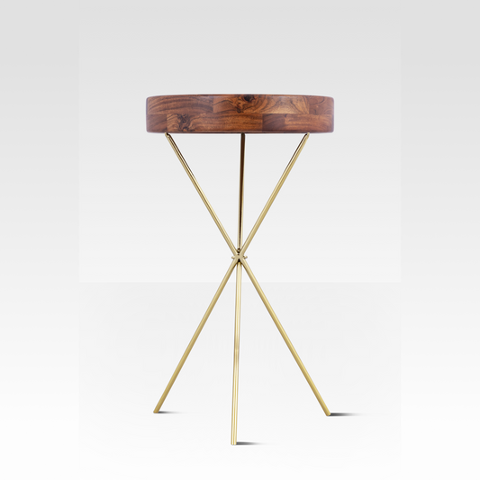 An angled view of the Quill End Table featuring a deep solid mango wood tray top resting on a minimalist gold tripod base.