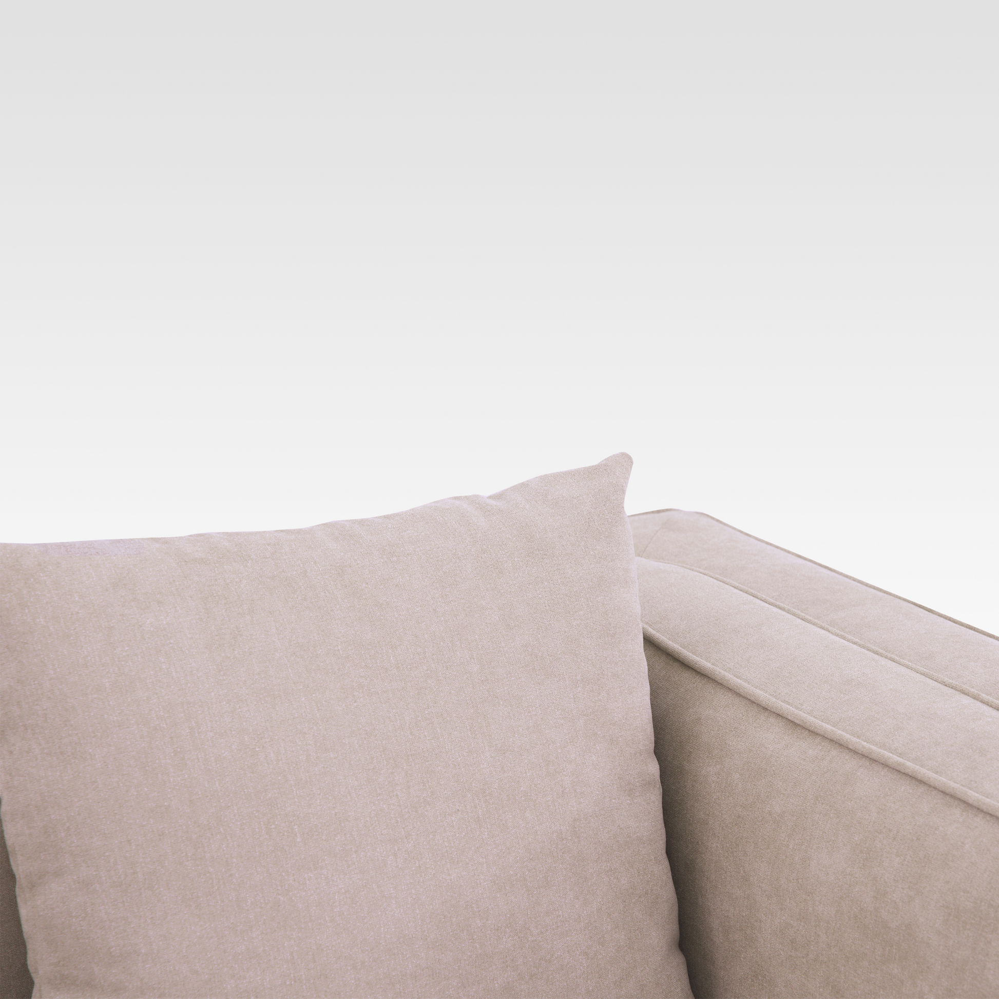 A macro view of the Seaside Sand fabric on the Elysian sofa, emphasizing the durable textured weave.